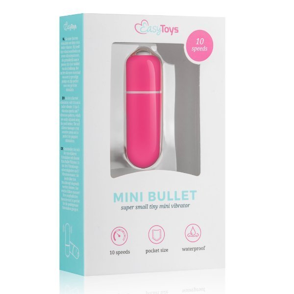 Mini vibrator roza barve v embalaži.