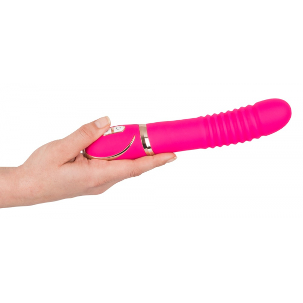 Vibrator roza barvev roki.