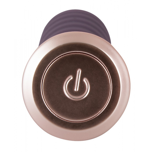 Vibrator vijolične barve - gumb za prižiganje.